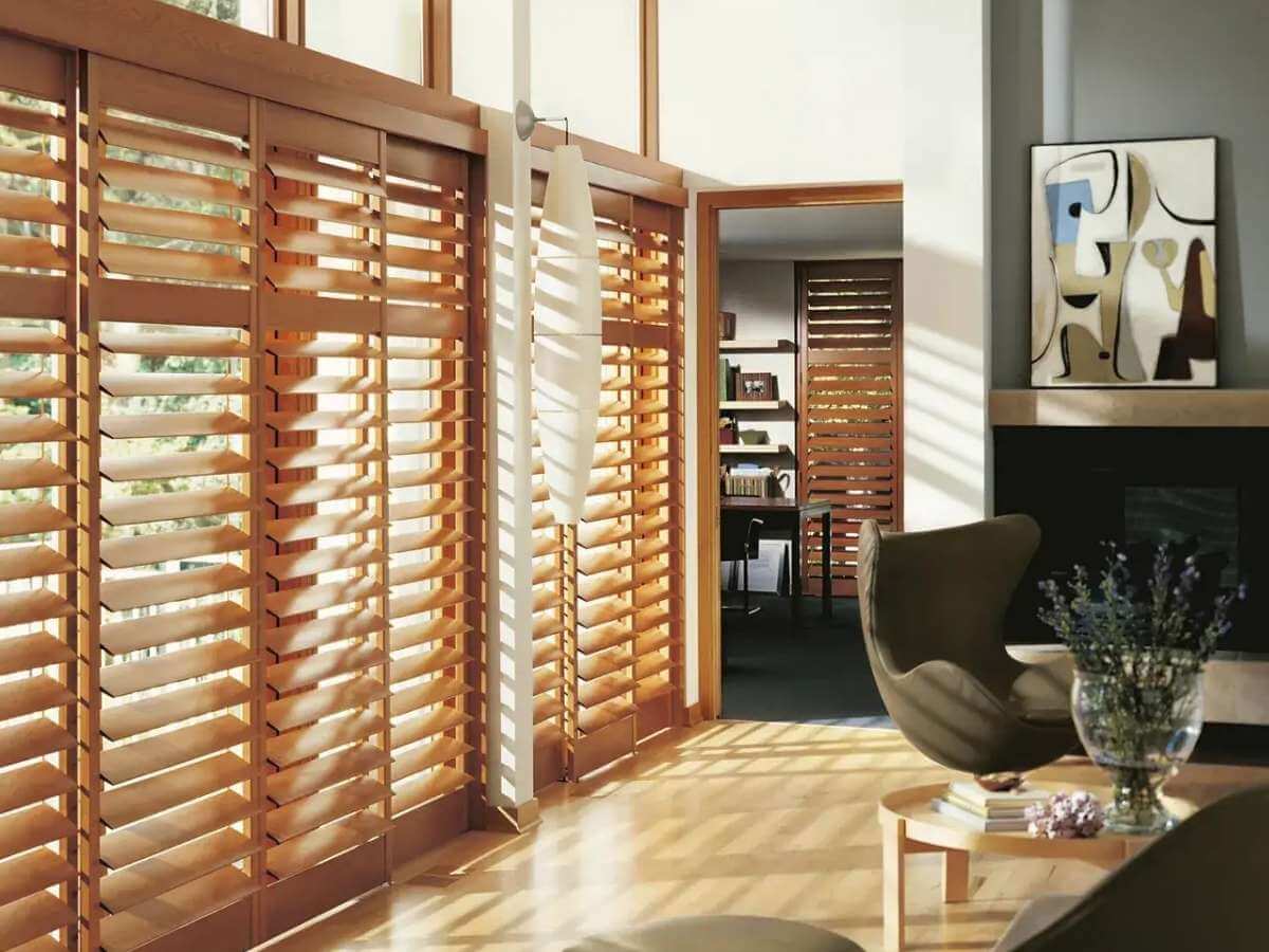 Stylish Master Bedroom Plantation Shutters in Leawood